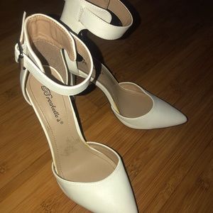 Woman white ankle strap high heels